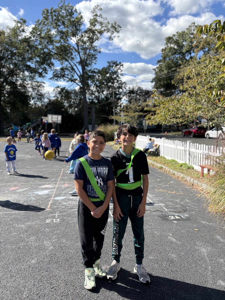 Student volunteers are enjoying their time with the younger children.