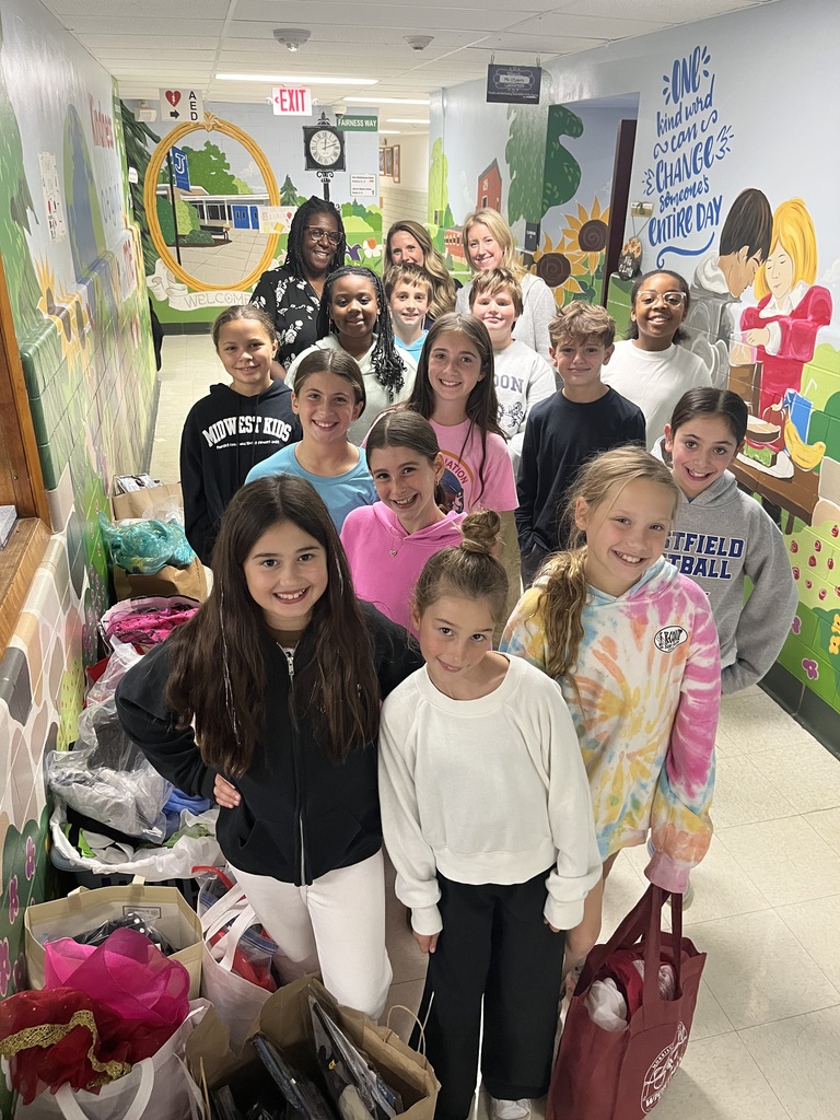 Students are proud to help organize all the donated costumes.