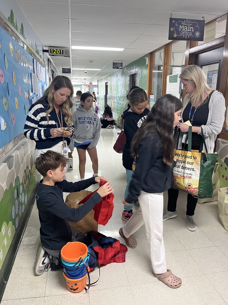 Students sorting the costumes.