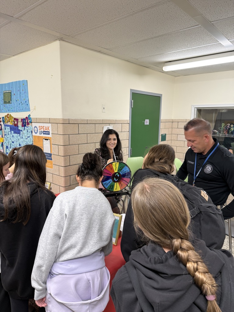 Student spinning trivia wheel 