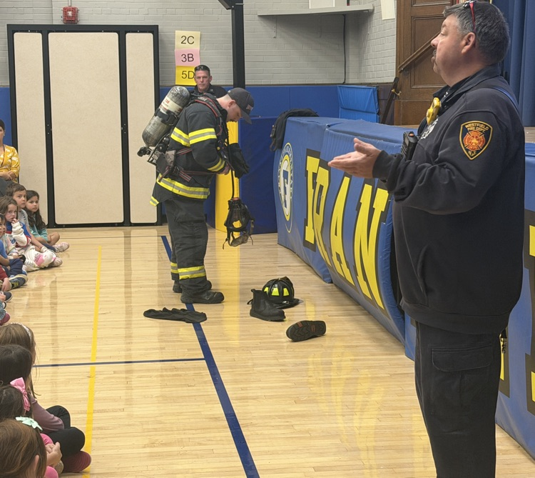 fire fighter and fire safety assembly