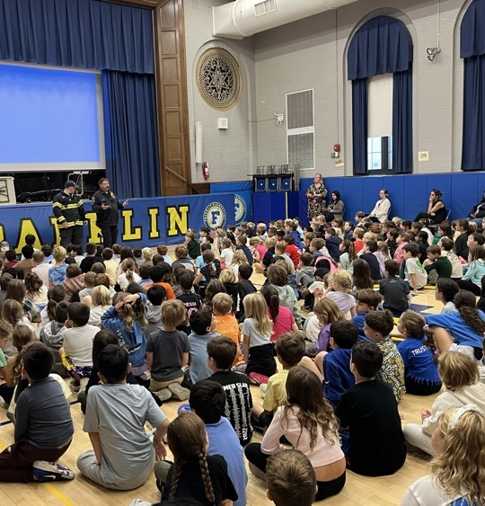 fire fighter and fire safety assembly