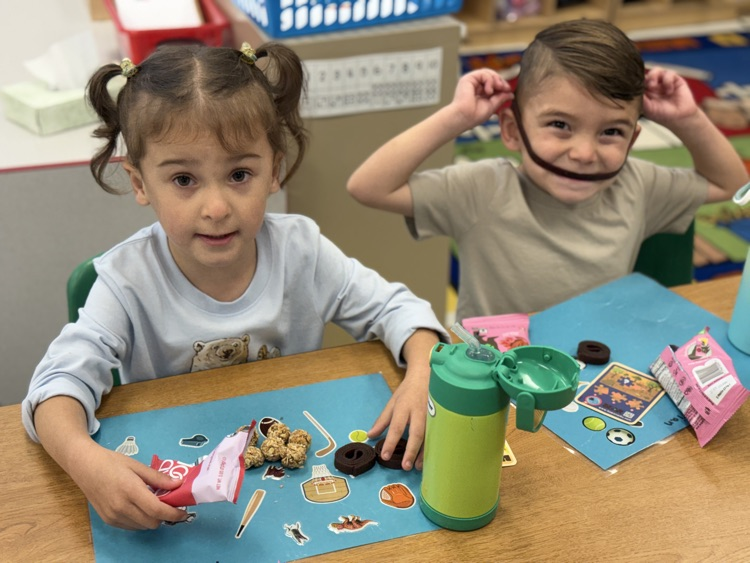 students engage in class snack time