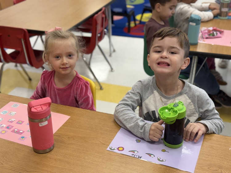students enjoy socializing during snack time