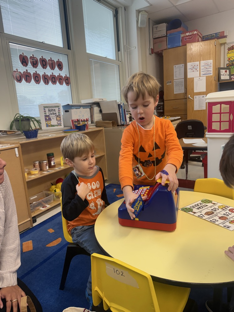 student engages in the dramatic play center during choice time