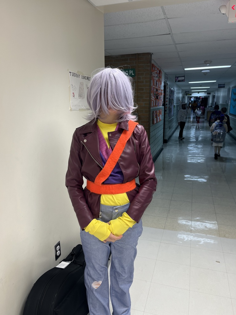 Student dressed in costume and doing safety patrol!