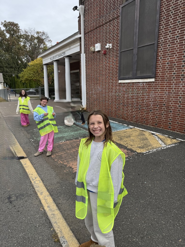 3 safety patrol members standing at their post
