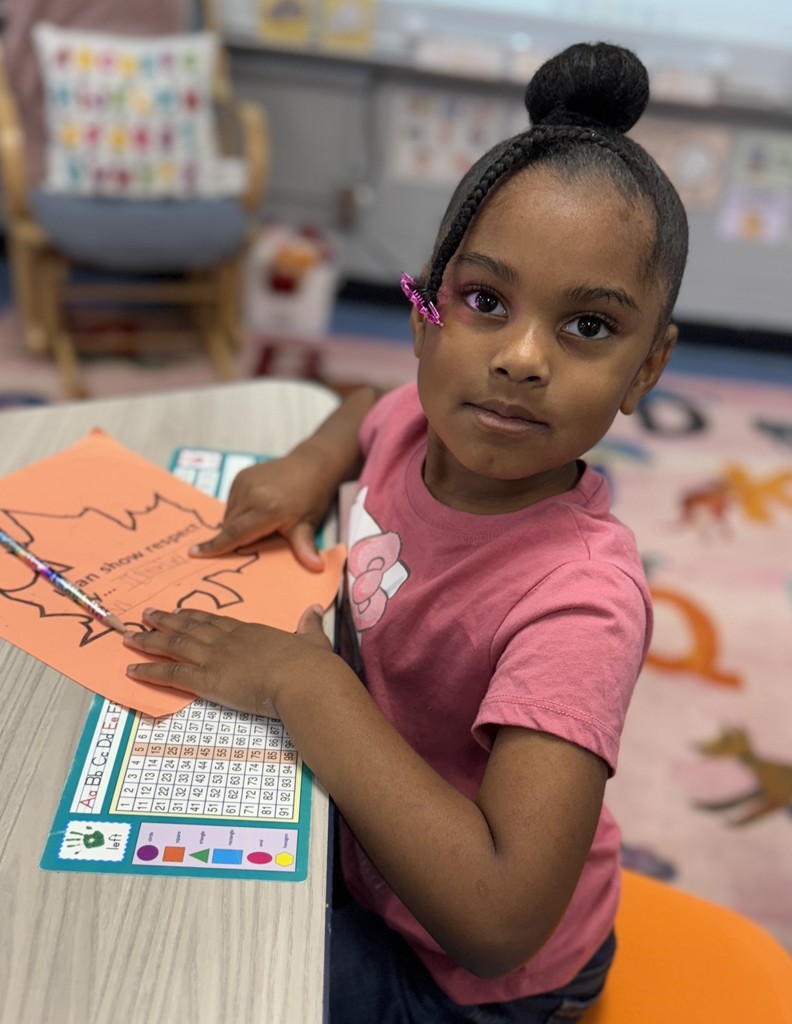 student working on a leaf of respect