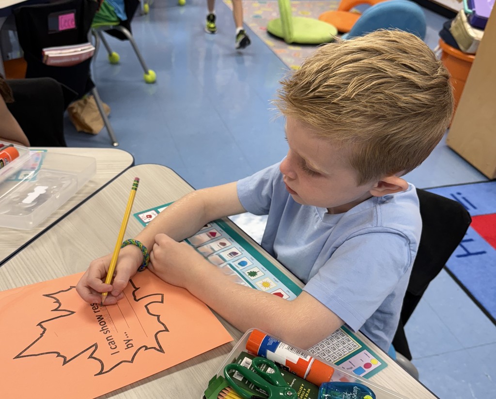 student working on a leaf of respect