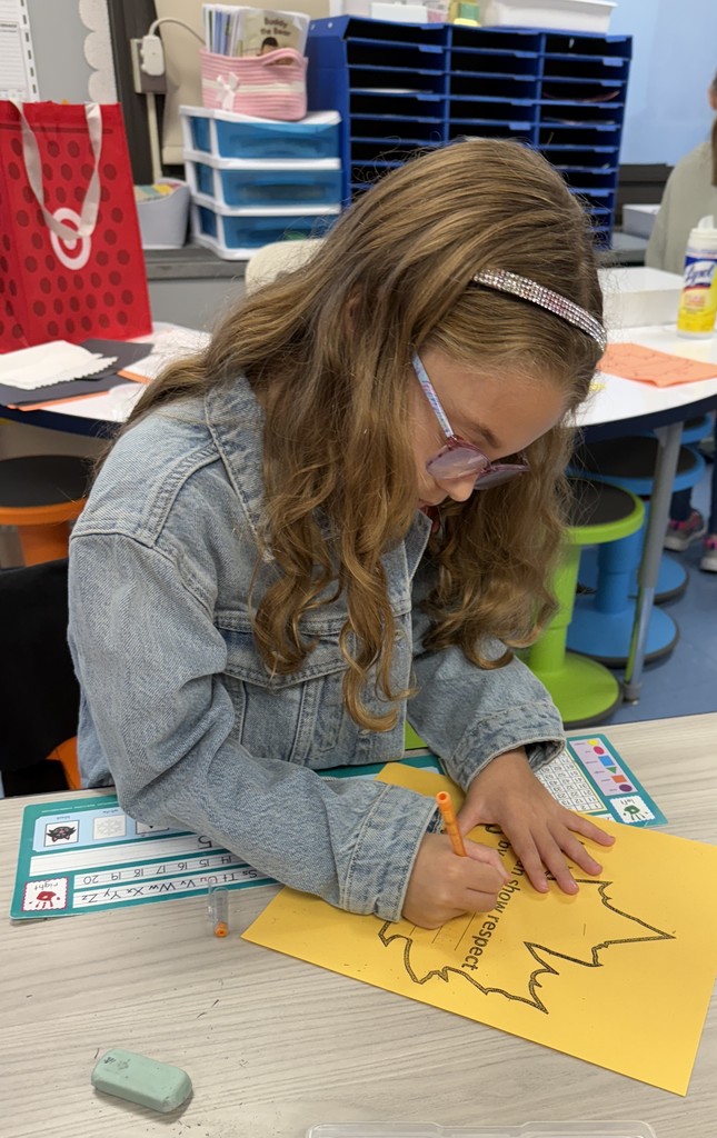 student working on a leaf of respect