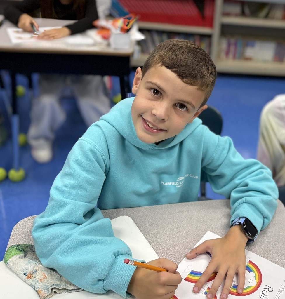 student working on factor rainbows