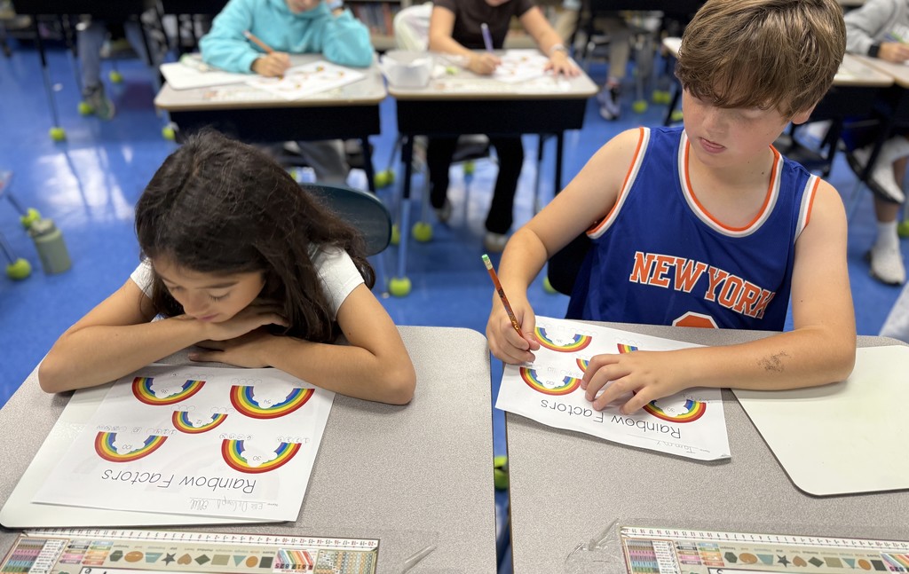 students working on factor rainbows