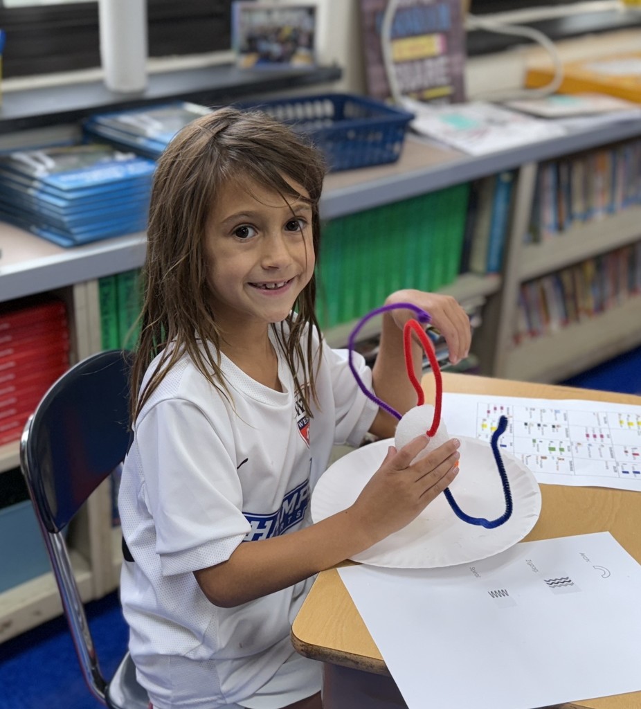 student working on a design challenge