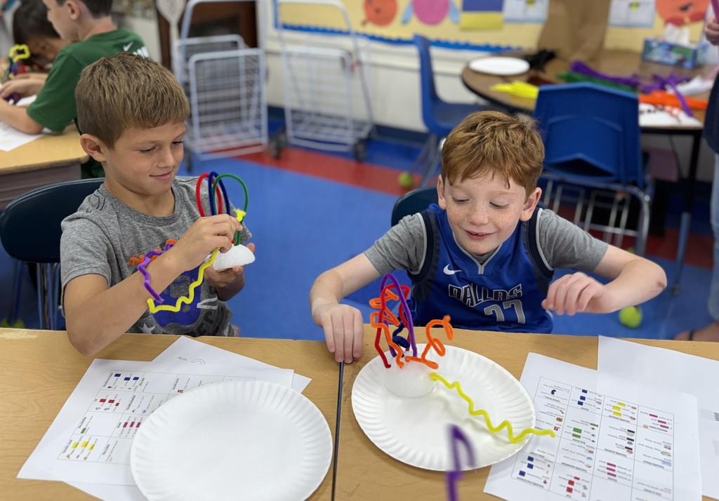 students working on a design challenge