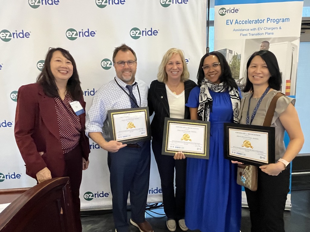 3 of westfield elementary principals and the mayor of westfield, holding their awards with a representative from the EZ ride organization