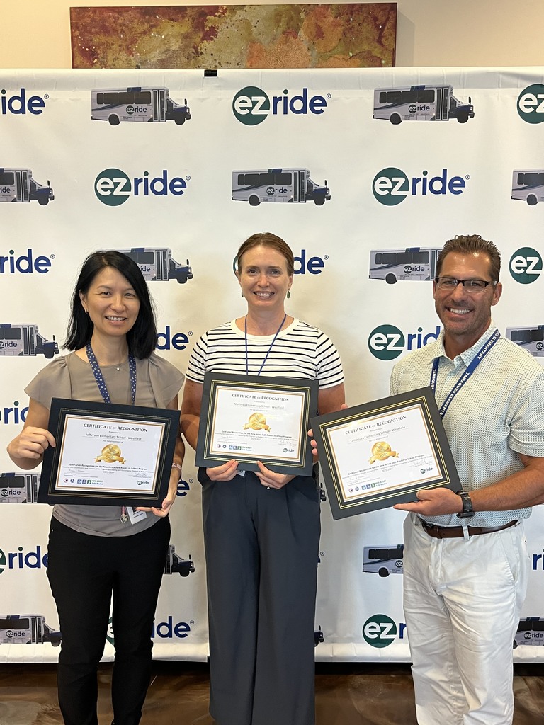 3 of westfield elementary principals holding their awards