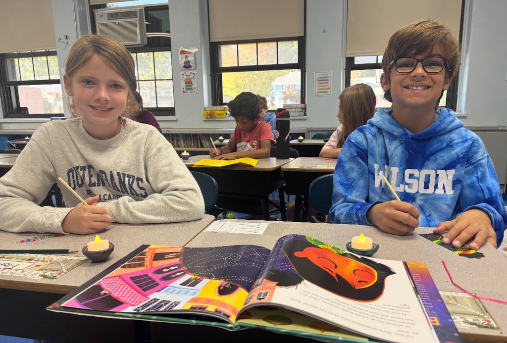 students working on diyas