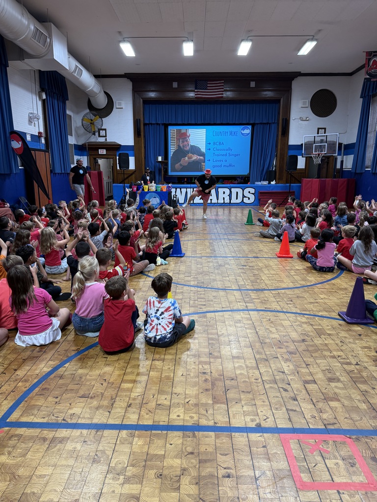students sitting in the gym during LeadU assembly