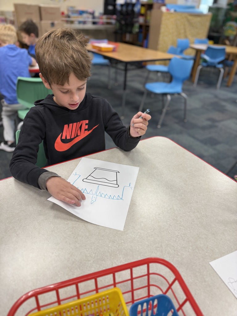 student working on their "wonderfully weird" plant