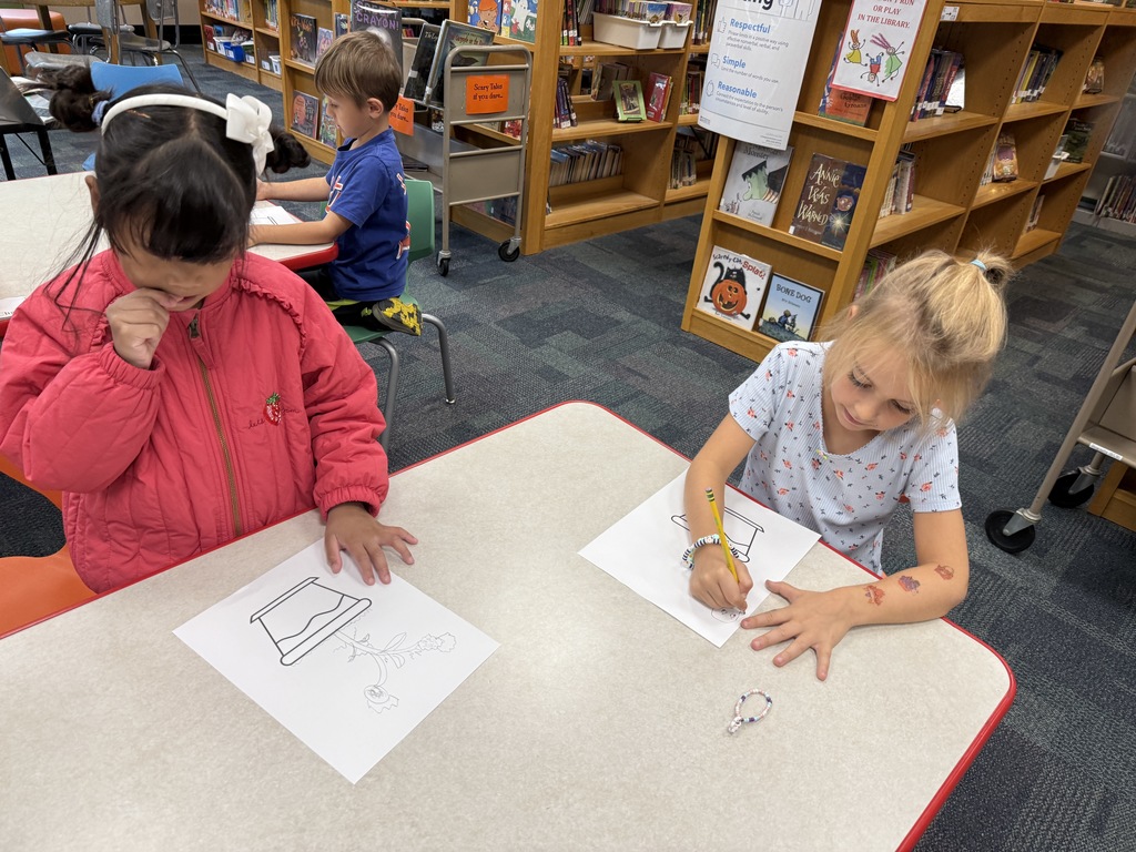 students working on their "wonderfully weird" plant