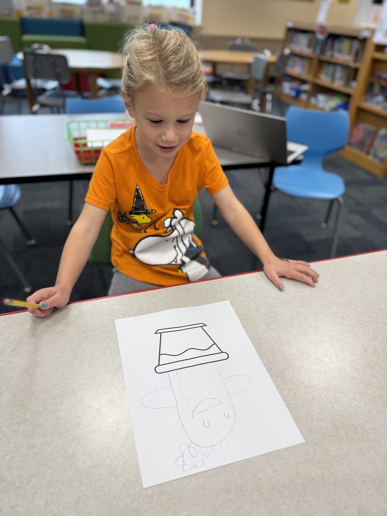 student working on their "wonderfully weird" plant