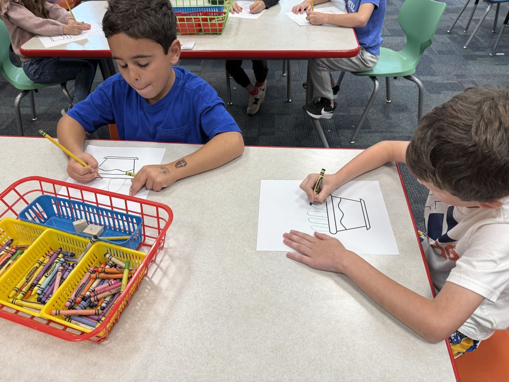 students working on their "wonderfully weird" plant