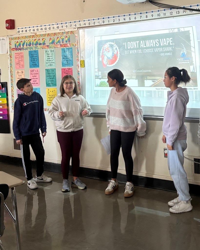 Students presenting advertisement 