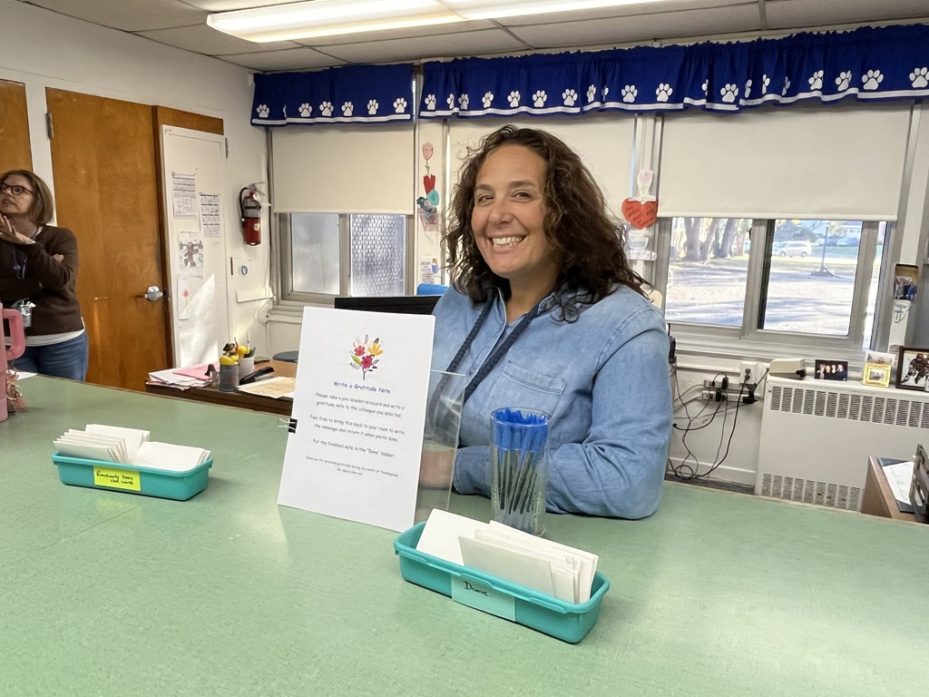 Teacher writes a gratitude note to a colleague.