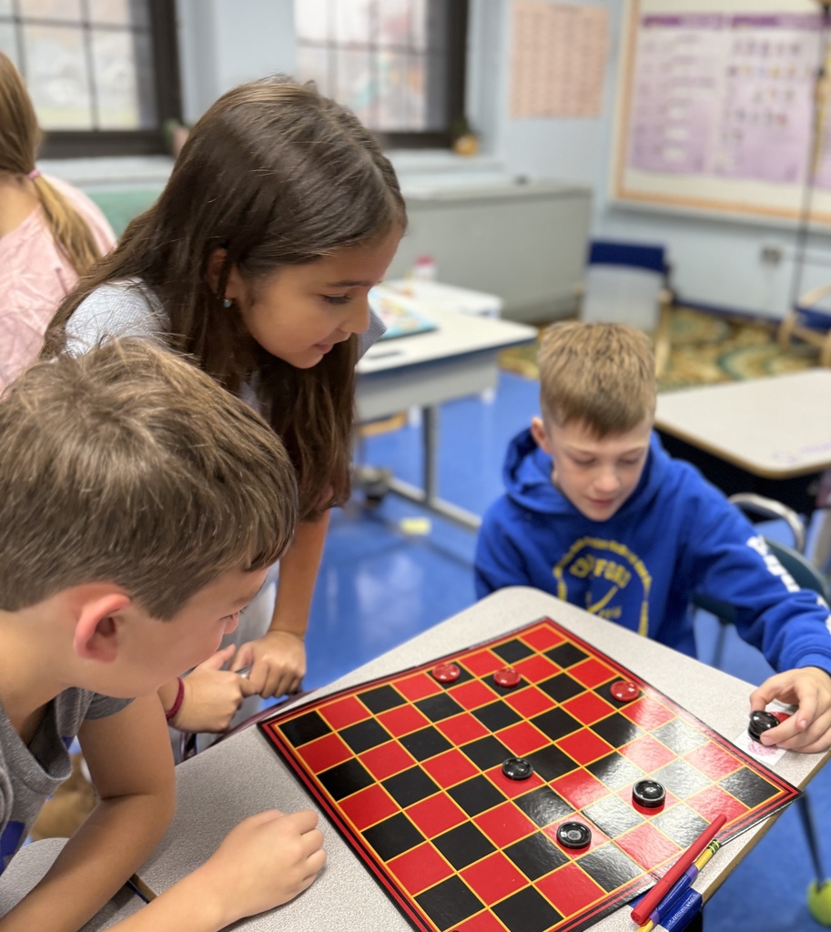 students playing checkers at recess