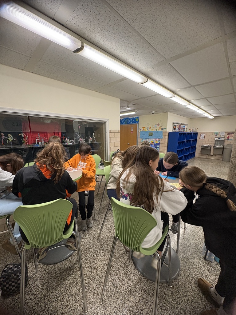 Group of students writing letters 