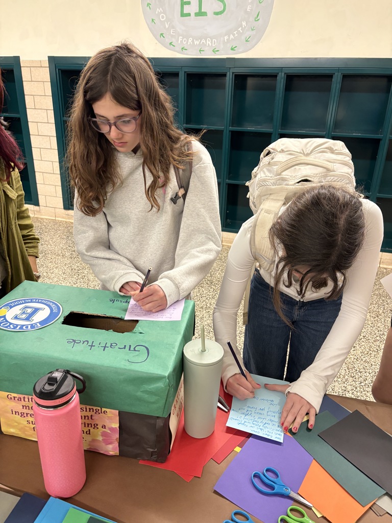 Students writing letters