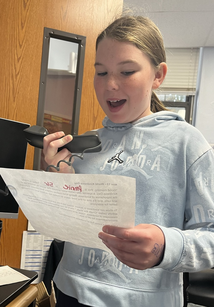 student making announcement 