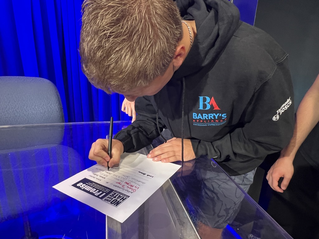 Student Signing Pledge