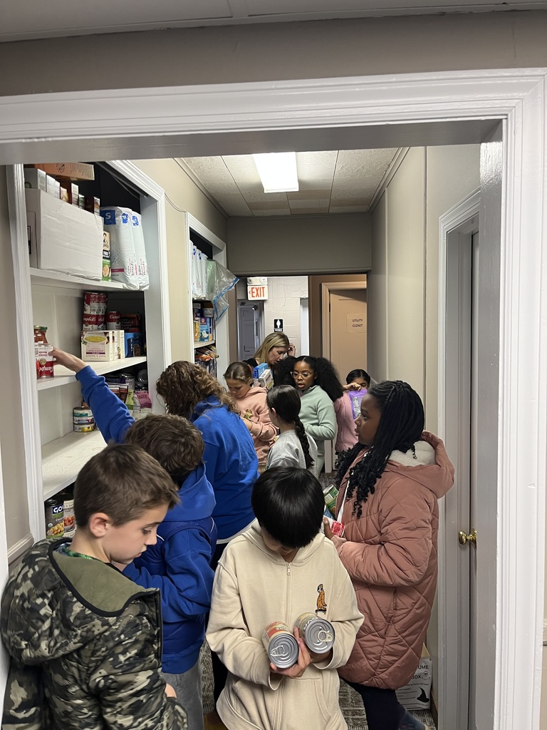 Students stocking the food pantry.