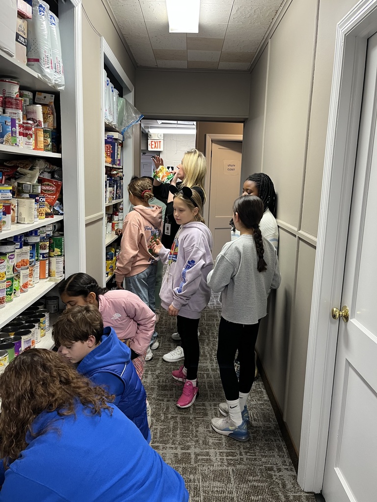 Students stocking the food pantry.