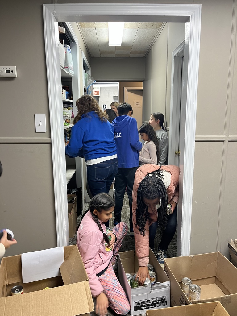 Students stocking the food pantry.