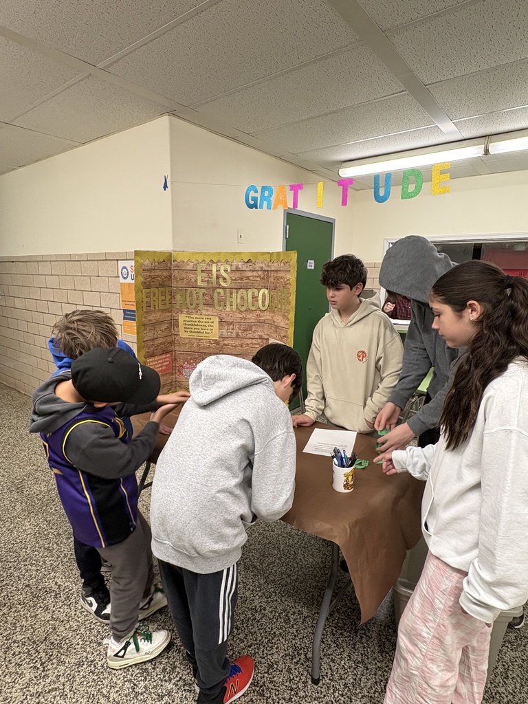 Peer leaders explaining activity to students