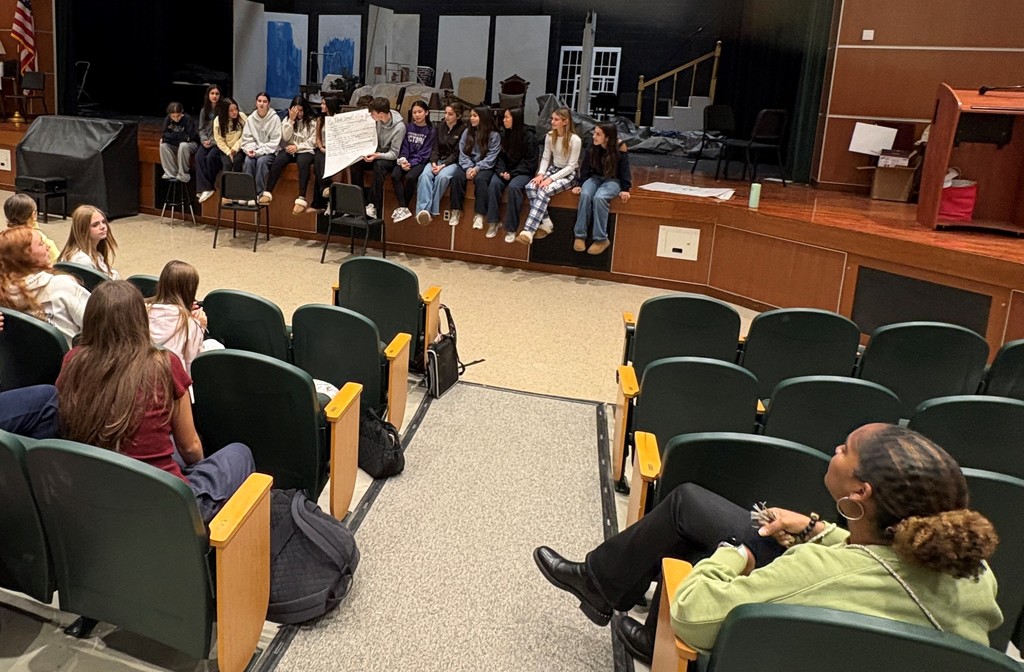 Peer Leaders presenting to Mrs. Shall 