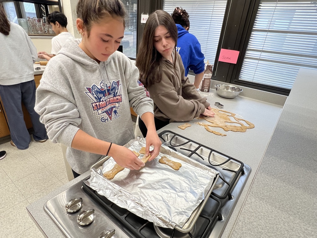 Students baking cookies