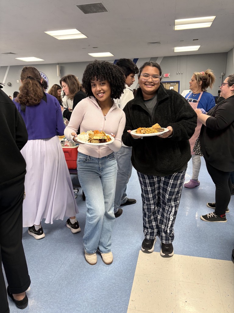 Students showing plate