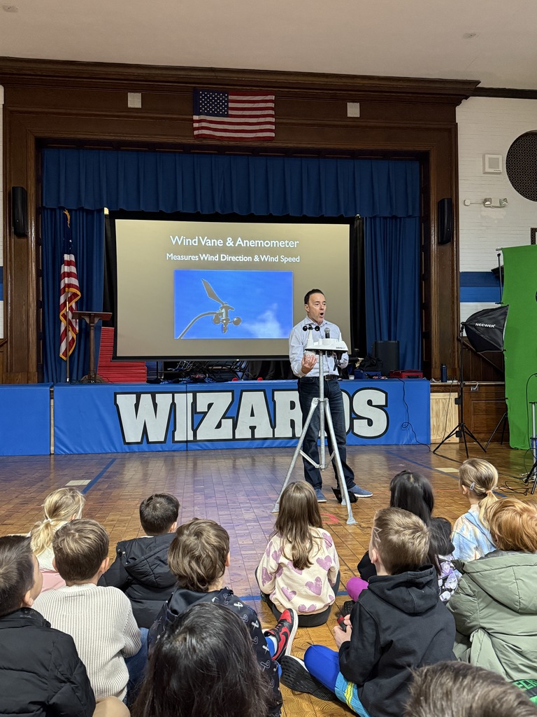 meteorologist, John Marshall, presenting to the first grade