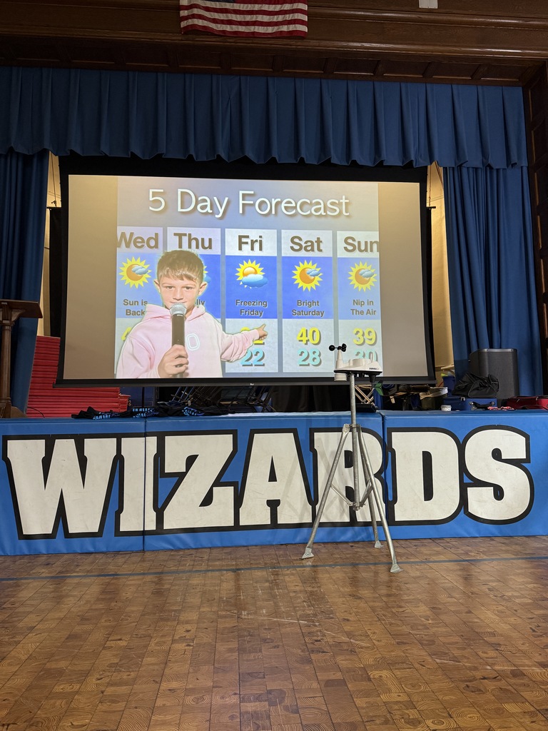 first grade student giving the weather forecast