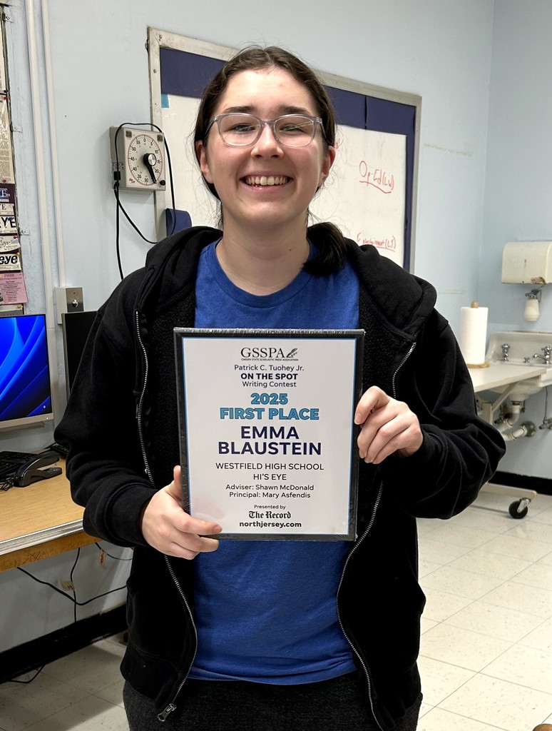 Student with her award plaque