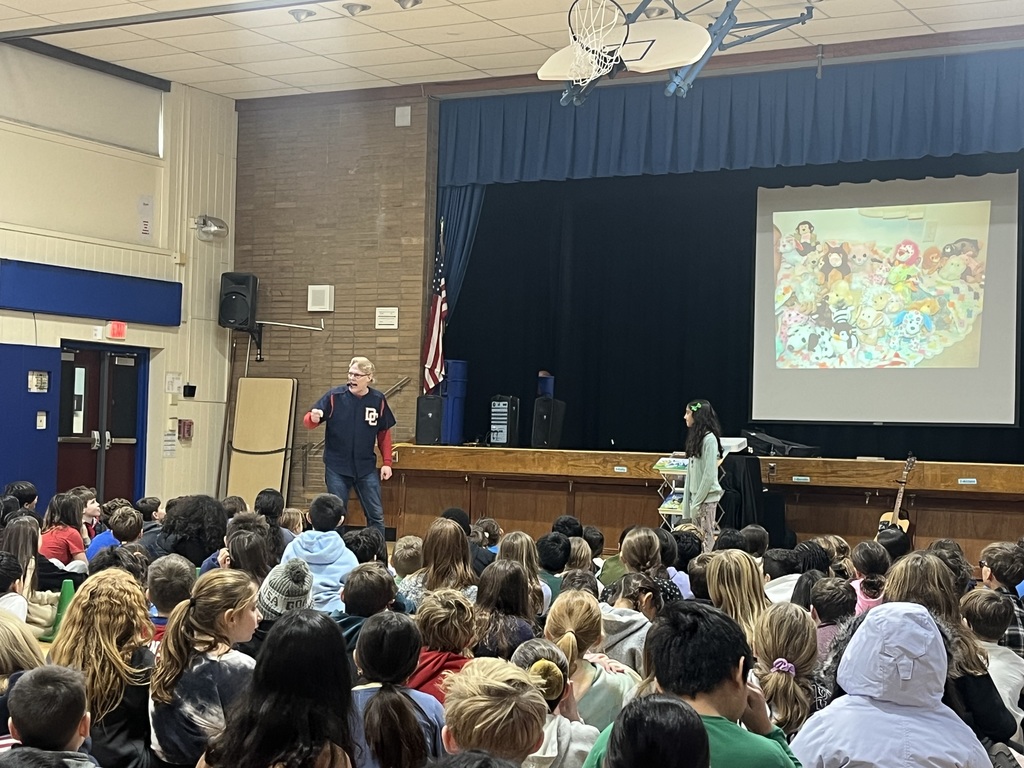 Presenter tells a story with the help of a student.