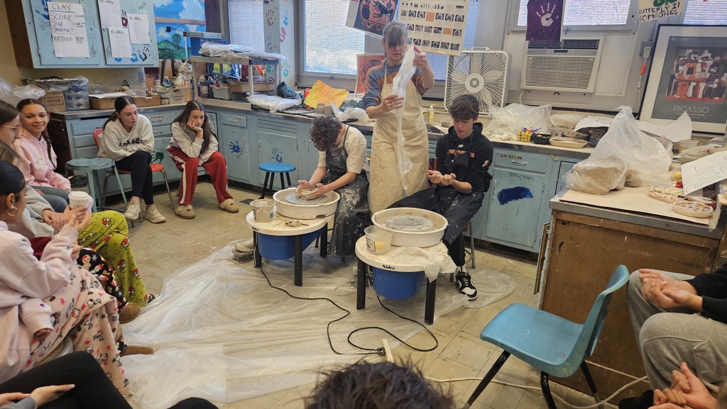 students at clay wheels