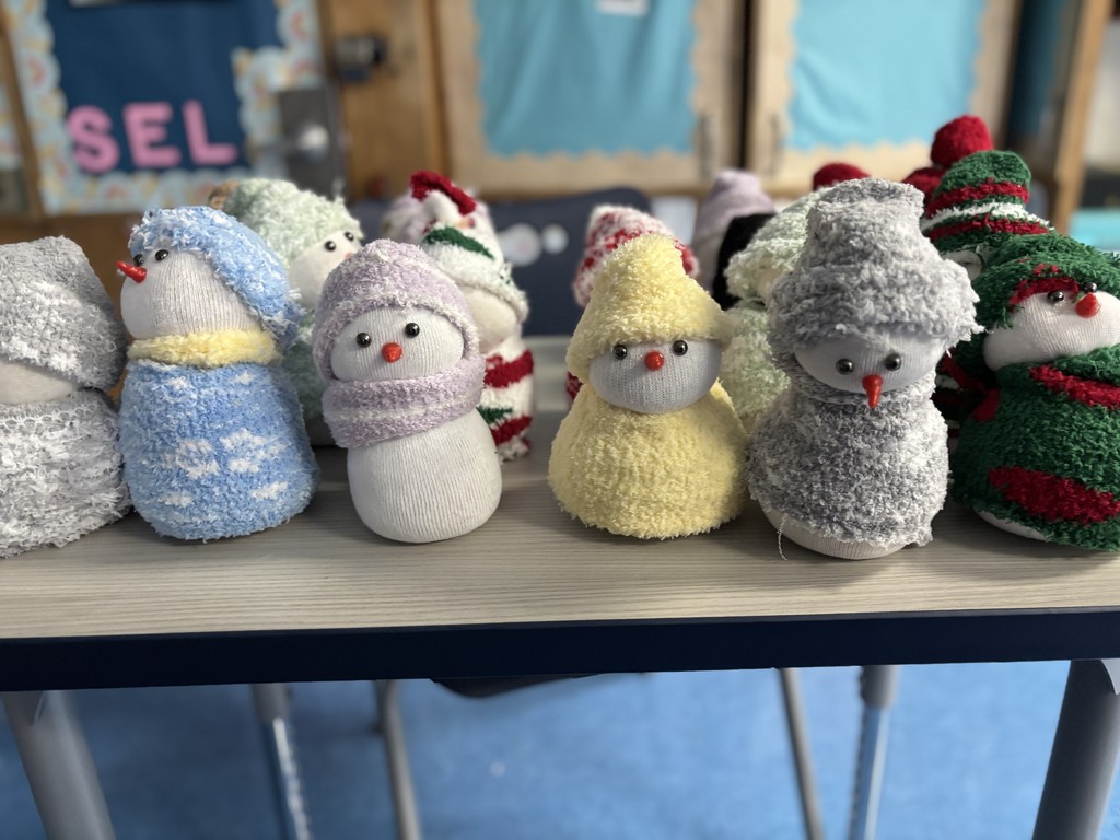Sock snowmen on display.