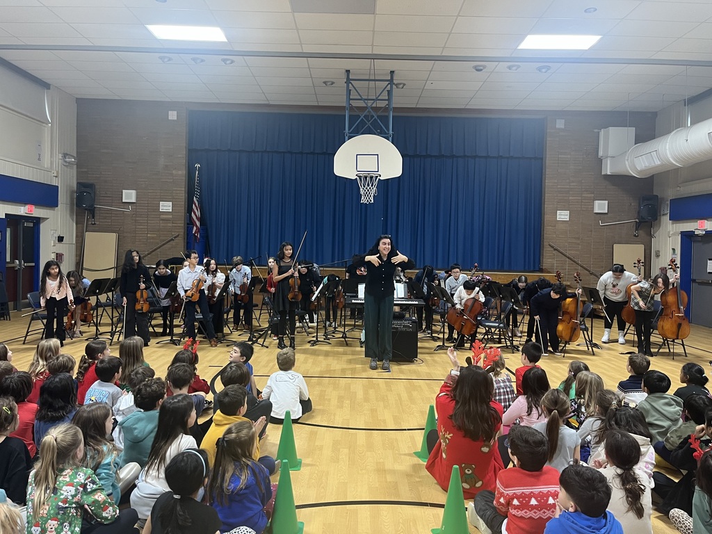 The orchestra takes a bow at the end of the performance. 