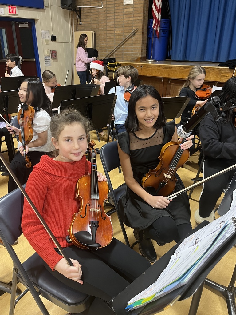 Orchestra students are waiting for the show to start.