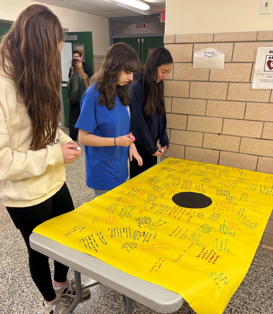 Student participating in black dot activity 