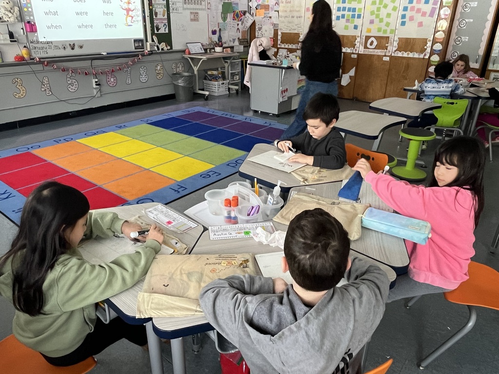 Students writing their word from the dictation.